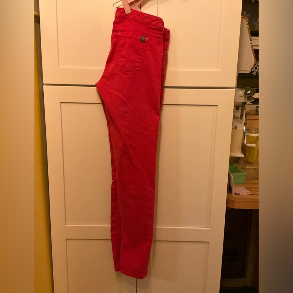 Red jeans from the North Face. 6